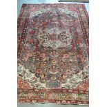 A hand knotted Persian Hamadan rug - 2.24m x 1.