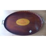 An Edwardian mahogany and shell inlaid oval tray