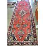 A hand knotted Persian Hamadan rug - 3.10m x 1.