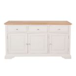 A new painted Aspen three door sideboard finished in a mushroom colour - with an oak top - W150cm x