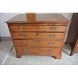 A Georgian mahogany chest with a slide above four graduating drawers on bracket feet - 81cm tall x