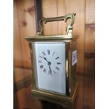 A Brass Carriage Clock - 13 cm tall - clean condition - working in saleroom