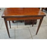 A 19th Century Mahogany fold-over card table