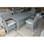 A Lloyd Loom rectangular table measuring 160cm x 90cm with four matching chairs