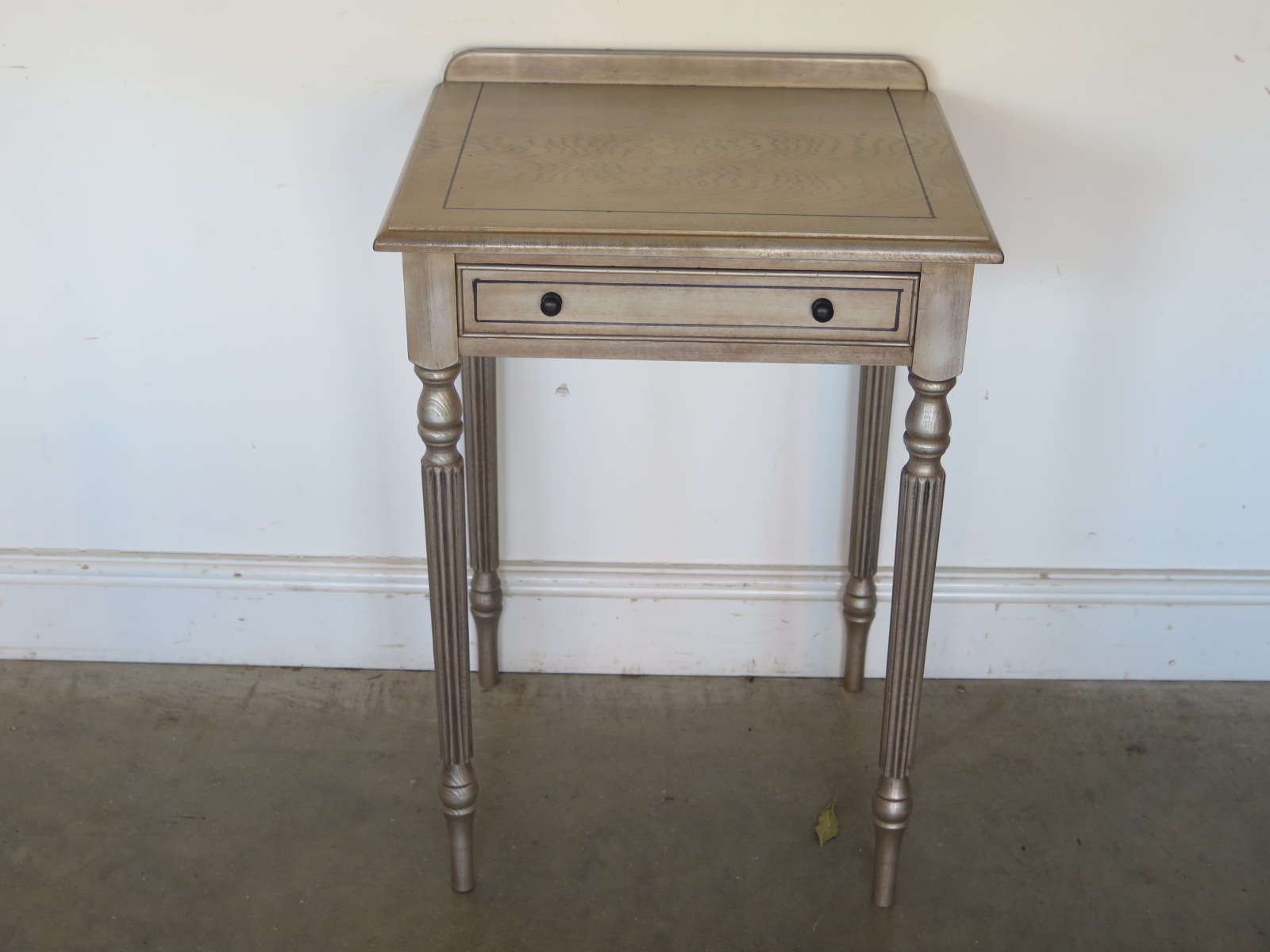 A modern grey side table - Height 73cm x Width 53cm - in good condition