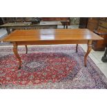 A French Dining Table on shaped legs - 76 cm tall x 213 cm x 91 cm - in good clean condition