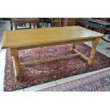 A large oak antique style refectory dining table by The Royal Oak Furniture Company - 77 cm tall x