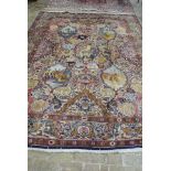 A hand knotted Persian Meshed rug - 3.50m x 2.