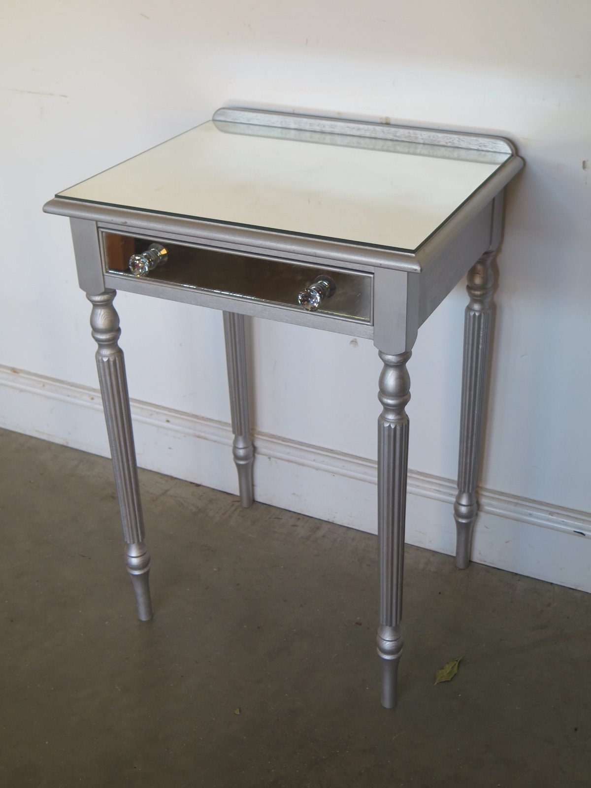 A modern silver side table with a mirrored top - Height 73cm x Width 53cm - in good condition - Image 2 of 2