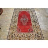 A hand knotted Persian Tabriz rug - 2.17m x 1.