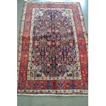 A hand knotted Persian Sarough rug - 1.57m x 1.