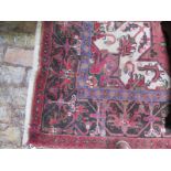 A hand knotted Persian Heriz rug - 3.00m x 2.