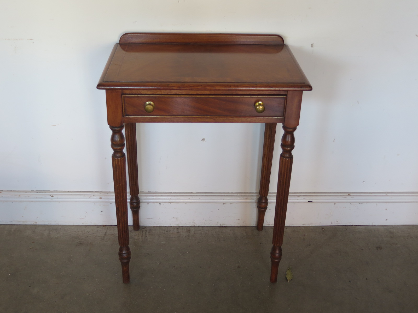 A walnut and crossbanded side table with a single drawer - Width 58cm - made by a local cabinet