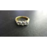 An 18ct yellow gold three stone diamond ring, approx total 1.0ct diamonds, size L, approx 3.