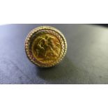 A 1903 gold half sovereign in a 9ct gold ring mount - size S,