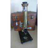 A Beck Model 29 Microscope No 386063 with black lacquered stand - with adaptions and missing parts