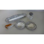 A Silver Pin Tray - 24 cm long and a pair of silver dishes - 9 cm diameter,