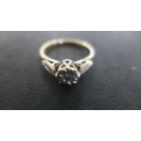A 9ct Yellow Gold Diamond Solitaire Ring, five small diamonds set to shoulder, size K, approx 2.