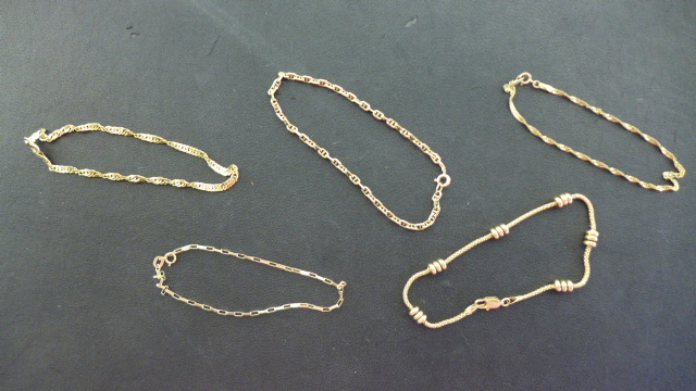 Five 9ct Yellow Gold Bracelets - approximate total weight 10.