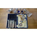 Assorted plated ware including a cruet and five bottle stops/pourers
