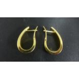 A pair of 18ct Yellow Gold Hoop Earrings - small usage marks, approximately 3.8 grams, 2.