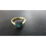 An 18ct Yellow Gold Emerald and Diamond Ring - Size H, approximately 1.