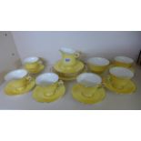 A Royal Winton Petunia Six Setting Tea Set with a sandwich plate - all good condition - minor usage