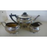 A Silver Hallmarked three piece Tea Service, Edinburgh 1913-14 - consisting of a teapot,