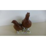 A Beswick Group Grouse No 2063 - tiny chip to base of larger Grouse