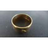 A 9ct Yellow Gold Wedding Band, Size V, approximately 6.