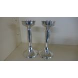 A pair of silver candlesticks - Sheffield 1964 - James Dixon and Son - with weighted bases,