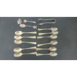 An Assortment of Silver Spoons, a nip and a watch fob - total weight approximately 7.