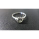 A Platinum Diamond Ring, incorporating a single round brilliant cut diamond, size approximately 6.