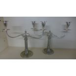 A pair of silver plated twin branch candlesticks - 33 cm tall x 40 cm wide - clean condition