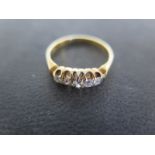 A yellow gold five stone diamond ring size N - approx weight 3.