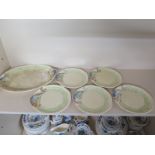 A Clarice Cliff Newport Pottery Fish Platter - 38 cm x 26 cm and Five Plates - all have some