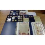 A collection of coins, including four large and five smaller - commemorating the diamond jubilee,