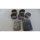 A quantity of hallmarked silver items to include aid memoir, cigarette case, napkin rings, approx 6.