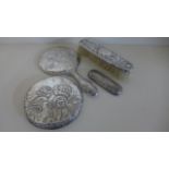A Dressing Set consisting of Hand Mirror with Handle,