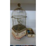 A 19th Century Clockwork Bird in a Cage - Automaton with Coin Operation - 56 cm tall x 25 cm x 25