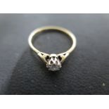 A 9ct Gold Modern Diamond Solitaire Ring - Diamond round, brilliant, colour G/H, clarity 11/12,
