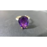 A 9ct Gold Amethyst and Diamond Ring - Size S - approximately 4.