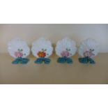 Four Victorian Ceramic Menu Holders in the form of Flowers and Leaves -one with a very minor chip -