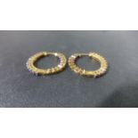 A pair of 9ct Gold Ruby Hoop Earrings - approximately 5 grams - in good condition
