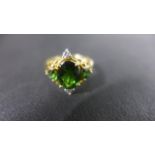 A 9ct gold chrome diopside and diamond ring - size N - approximately 2.