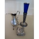 A Dutch Silver Vase Holder with pierced foliate decoration and blue glass liner,