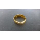 A 22ct Gold Band Ring - size P, approximately 3.