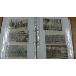 An album containing approximately 178 postcards relating to World War One and a number of News