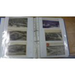An Album containing approximately 175 postcards relating to World War One and a number of News