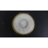 A Mother of Pearl and Gilt Metal Compact - 5 cm diameter - good conditon